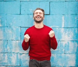 man_in_red_crew_neck_sweatshirt